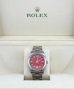 Alternative view of Rolex Oyster Perpetual 36 126000 Stainless Steel Coral Red Dial