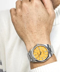 Alternative view of Rolex Oyster Perpetual 41 124300 Stainless Steel Yellow Dial